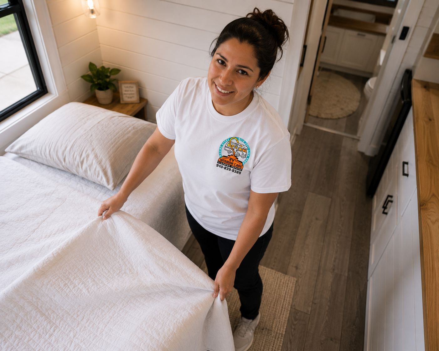 RV Interior Care team member making a bed in a tiny home in Texoma